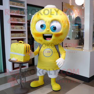 Lemon Yellow Cupcake mascot costume character dressed with a Henley Shirt and Messenger bags