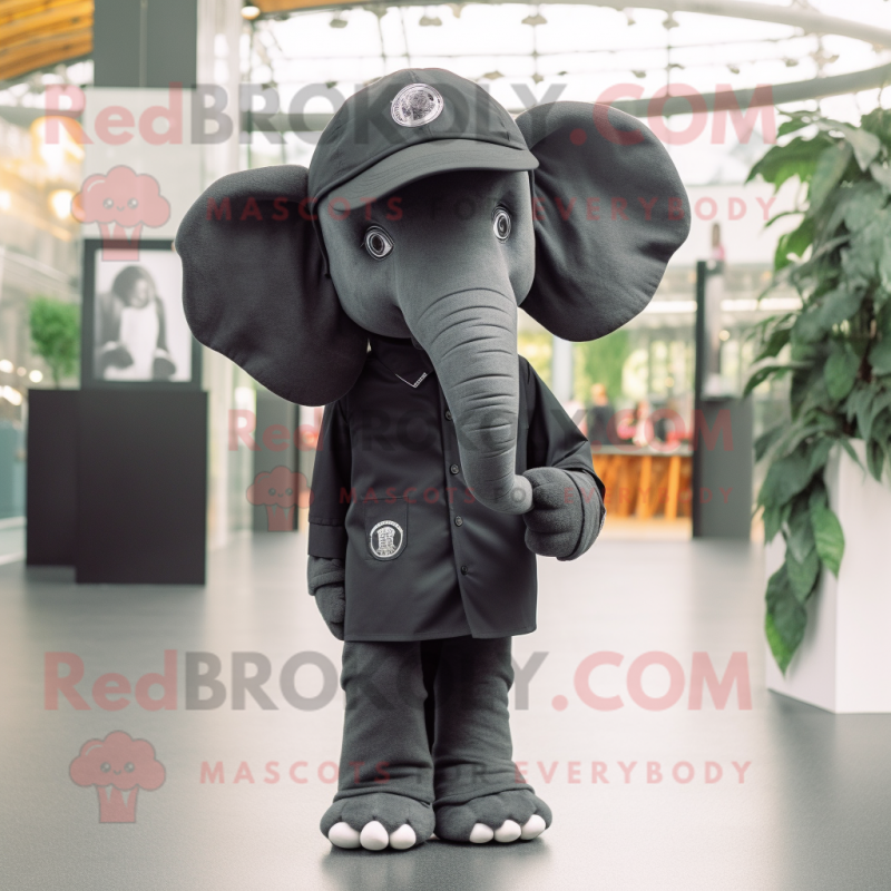 Black Elephant mascot costume character dressed with a Polo Tee and Berets Black Elephant mascot costume character dressed with a Polo Tee and Berets