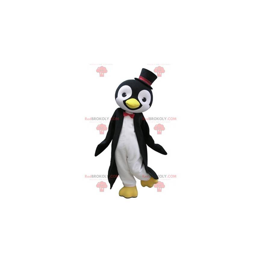 Mascotte de pingouin noir et blanc avec un chapeau haut de