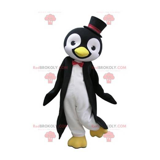 Mascotte de pingouin noir et blanc avec un chapeau haut de