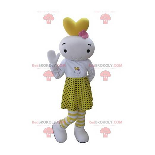 Mascota de muñeco de nieve blanco y amarillo vestida con una