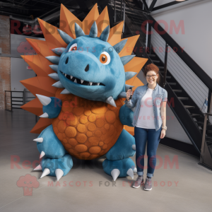 Rust Stegosaurus mascot costume character dressed with a Boyfriend Jeans and Rings