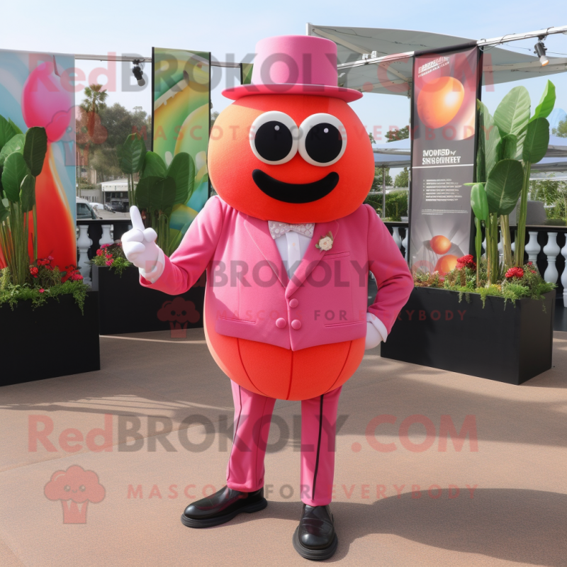 Pink Tomato mascot costume character dressed with a Blazer and Gloves