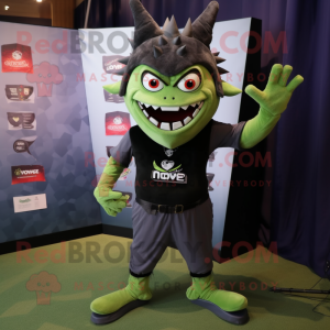 Olive Vampire mascot costume character dressed with a Joggers and Brooches