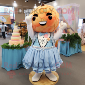 Peach Wedding Cake mascot costume character dressed with a Chambray Shirt and Hair clips