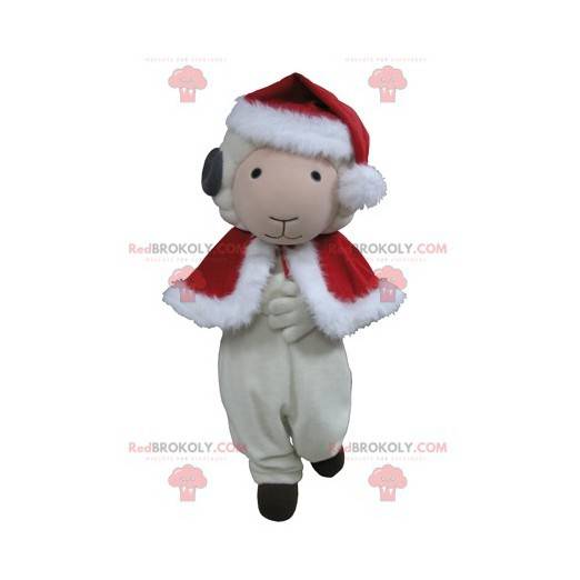 Mascote cabra ovelha branca e preta em traje de Natal -