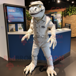 White Komodo Dragon mascot costume character dressed with a Jeans and Cufflinks