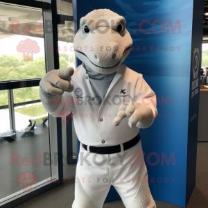 White Komodo Dragon mascot costume character dressed with a Jeans and Cufflinks