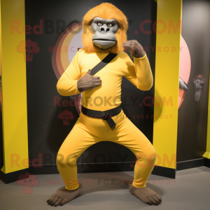 Yellow Baboon mascot costume character dressed with a Yoga Pants and Belts