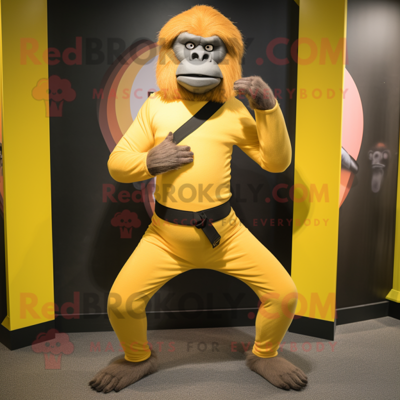 Yellow Baboon mascot costume character dressed with a Yoga Pants and Belts Yellow Baboon mascot costume character dressed with a Yoga Pants and Belts