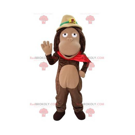 Braunes Affenmaskottchen mit einem Entdeckerhut - Redbrokoly.com