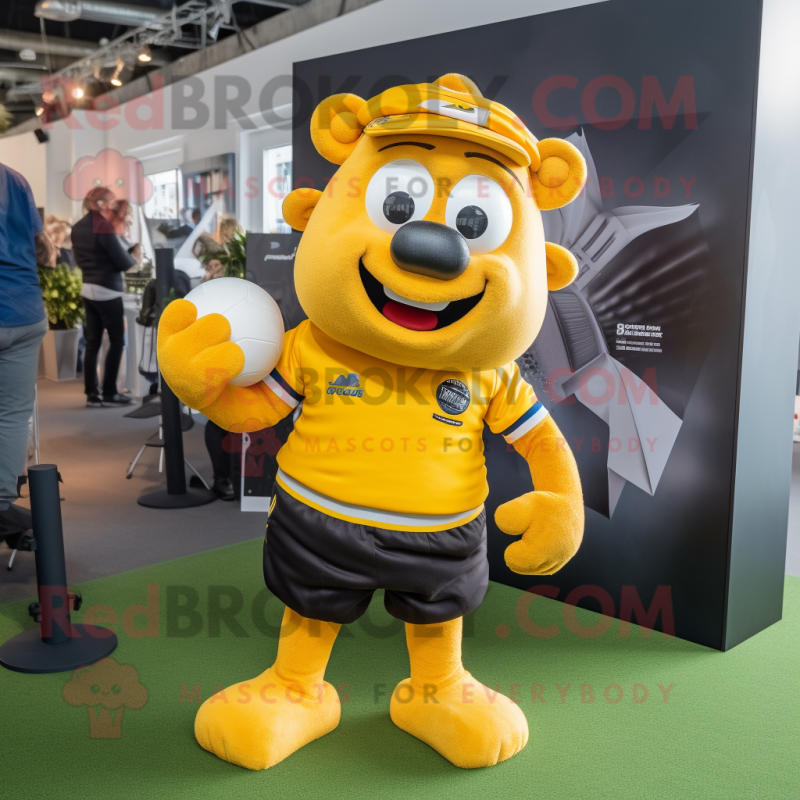 Yellow Momentum mascot costume character dressed with a Rugby Shirt and Beanies Yellow Momentum mascot costume character dressed with a Rugby Shirt and Beanies