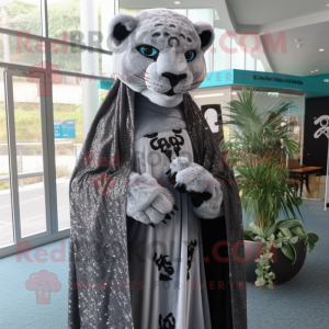 Silver Panther mascot costume character dressed with a Cover-up and Shawl pins