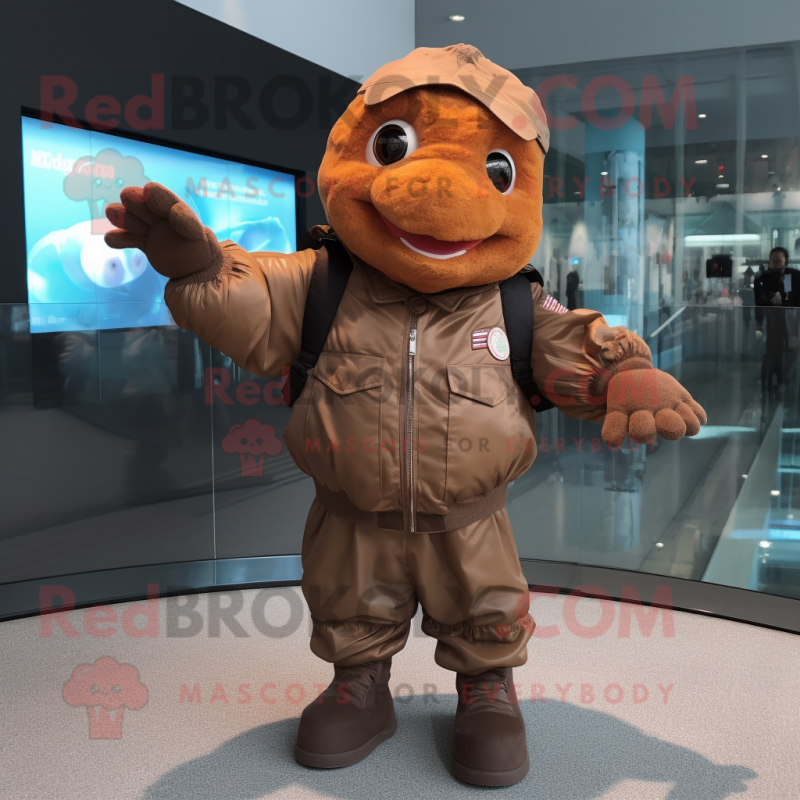 Brown Goldfish mascot costume character dressed with a Bomber Jacket and Gloves