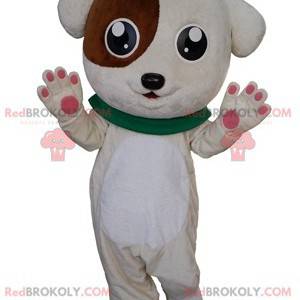 Mascotte de chiot blanc et marron mignon et doux -