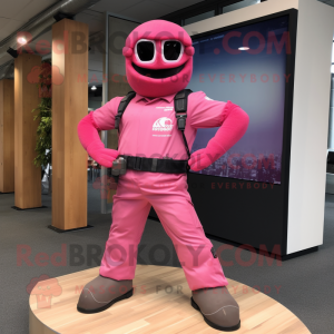 Pink Commando mascot costume character dressed with a Jeans and Anklets