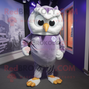 Lavender Owl mascot costume character dressed with a Joggers and Ties