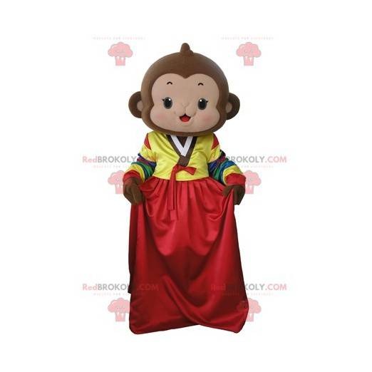 Braunes Affenmaskottchen mit einem bunten Kleid - Redbrokoly.com