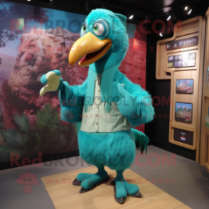 Turquoise Dodo Bird mascot costume character dressed with a Jacket and Keychains