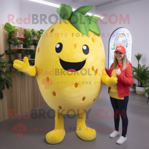 Yellow Strawberry mascot costume character dressed with a Jeggings and Brooches