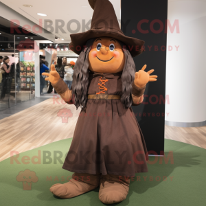 Brown Witch mascot costume character dressed with a Jeggings and Berets
