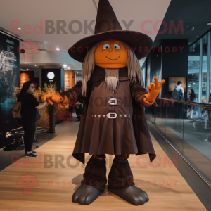 Brown Witch mascot costume character dressed with a Jeggings and Berets