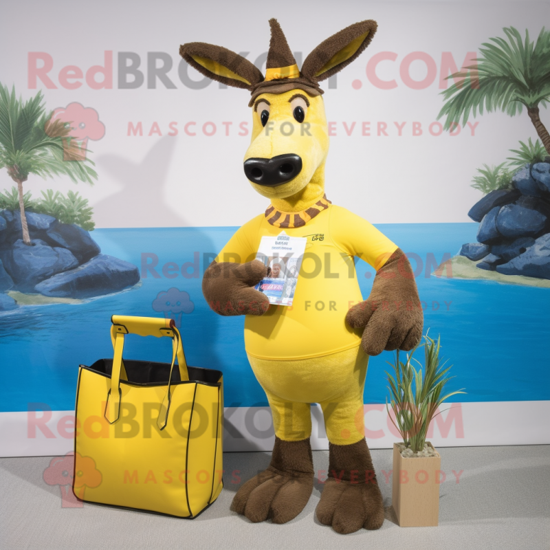 Yellow Donkey mascot costume character dressed with a Swimwear and Handbags Yellow Donkey mascot costume character dressed with a Swimwear and Handbags