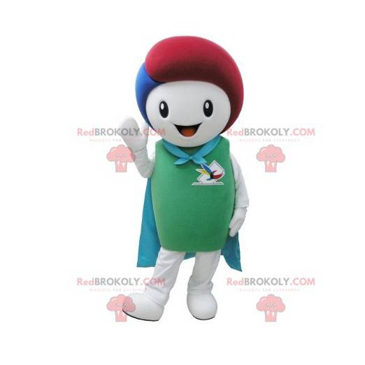 Mascota de muñeco de nieve blanco y verde con una capa -