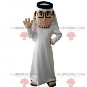 Bearded sultan mascot with a white outfit and glasses