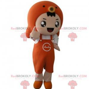 Orange pojkemaskot med ett förkläde och en fisk - Redbrokoly.com