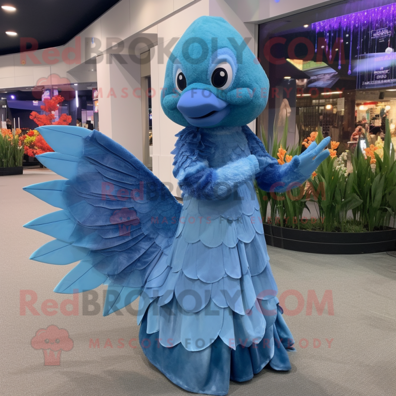 Sky Blue Betta Fish mascot costume character dressed with a Evening Gown and Mittens