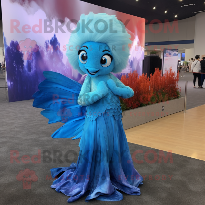 Sky Blue Betta Fish mascot costume character dressed with a Evening Gown and Mittens