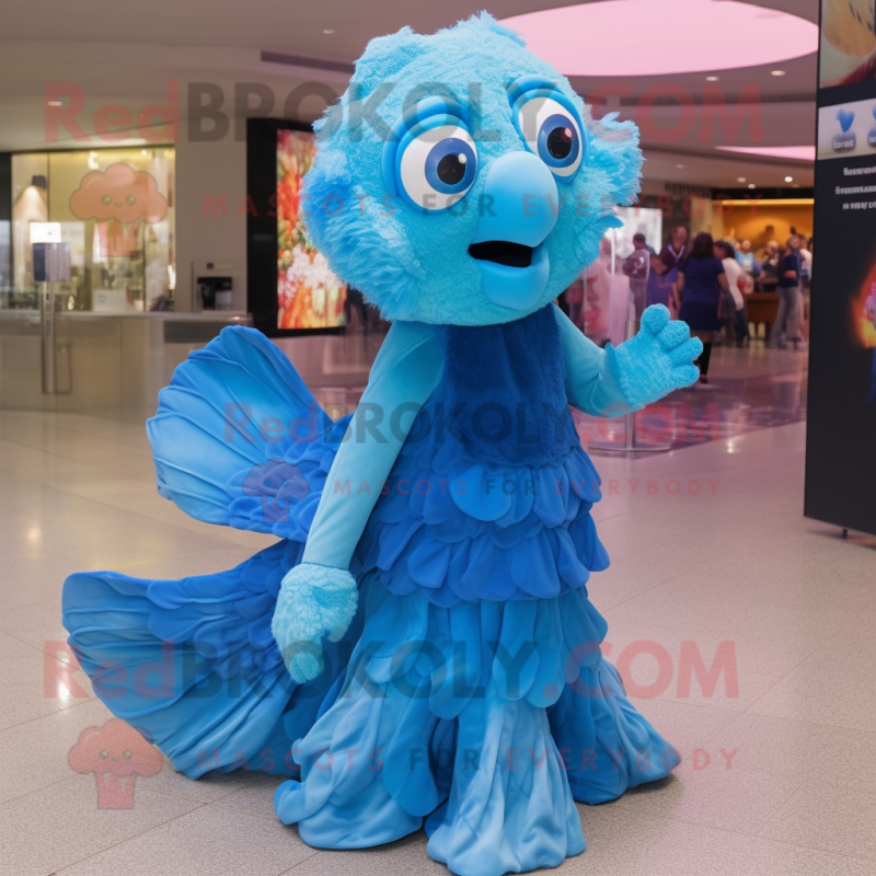 Sky Blue Betta Fish mascot costume character dressed with a Evening Gown and Mittens Sky Blue Betta Fish mascot costume character dressed with a Evening Gown and Mittens