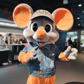 Orange Mouse mascot costume character dressed with a Denim Shirt and Rings