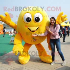 Lemon Yellow Crab mascot costume character dressed with a Boyfriend Jeans and Scarves