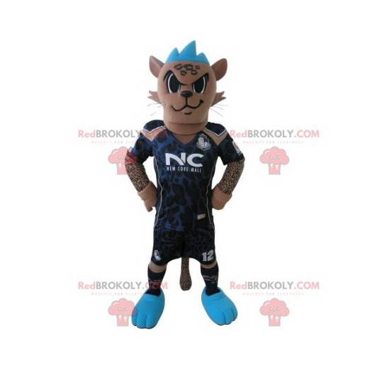 Mascote tigre com roupa de jogador de futebol e crista azul -