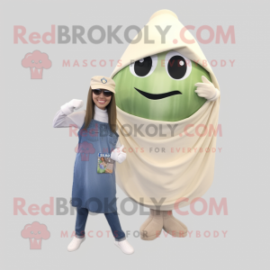 Beige Melon mascot costume character dressed with a Mom Jeans and Shawl pins