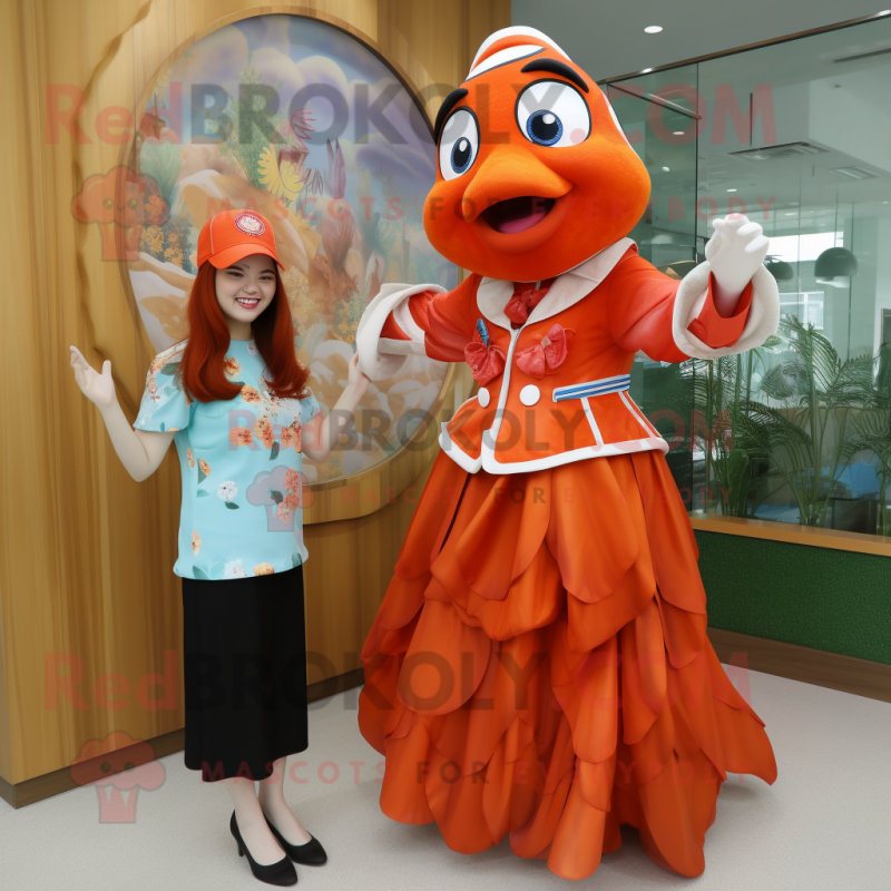 Red Clown Fish mascot costume character dressed with a A-Line Skirt and Watches Red Clown Fish mascot costume character dressed with a A-Line Skirt and Watches