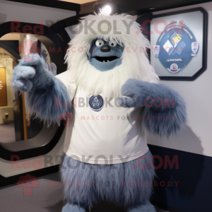 Navy Yeti mascot costume character dressed with a Denim Shorts and Shawl pins