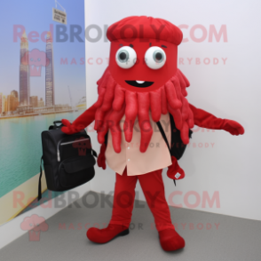 Red Fried Calamari mascot costume character dressed with a Dress Pants and Backpacks