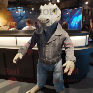 Gray Komodo Dragon mascot costume character dressed with a Jeans and Cufflinks