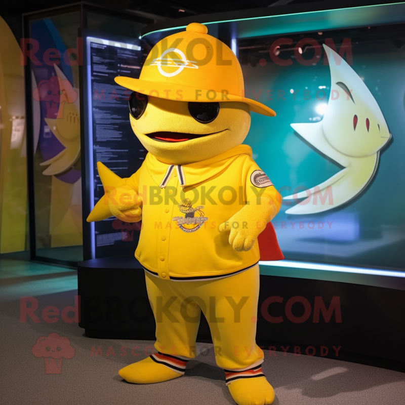 Yellow Shark mascot costume character dressed with a T-Shirt and Berets