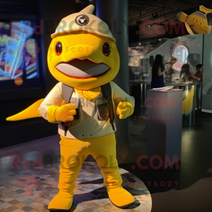 Yellow Shark mascot costume character dressed with a T-Shirt and Berets