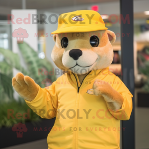 Yellow Mongoose mascot costume character dressed with a Windbreaker and Hat pins