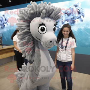 Gray Sea Horse mascot costume character dressed with a T-Shirt and Hair clips
