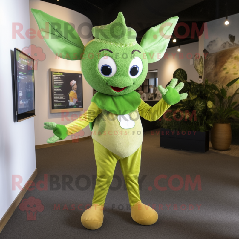 Olive Tooth Fairy mascot costume character dressed with a Jumpsuit and Brooches Olive Tooth Fairy mascot costume character dressed with a Jumpsuit and Brooches