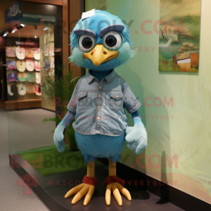 Teal Quail mascot costume character dressed with a Denim Shorts and Anklets