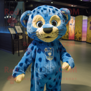 Blue Cheetah mascot costume character dressed with a Corduroy Pants and Keychains