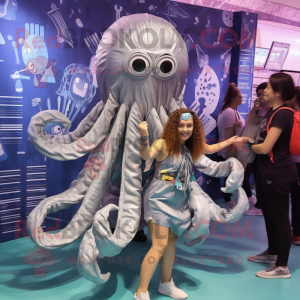 Silver Kraken mascot costume character dressed with a Mini Skirt and Cummerbunds