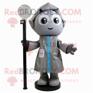 Gray Gumball Machine mascot costume character dressed with a Raincoat and Tote bags